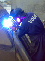 Welding Excavator Bucket on Site